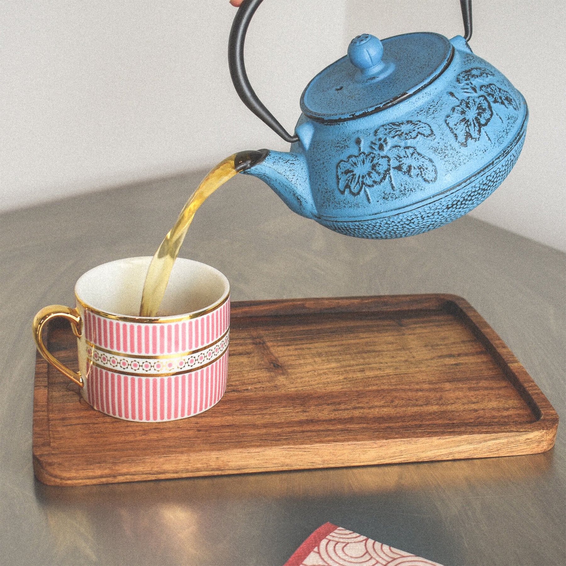 Traditional cast iron blue teapot